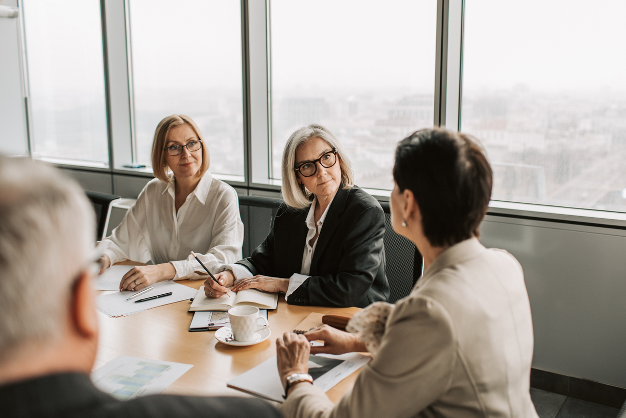 Elderly Women in a Business Meeting